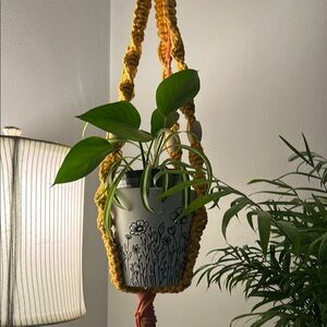 Floral Hanging Planter with Yellow Macrame and wood bead accents.